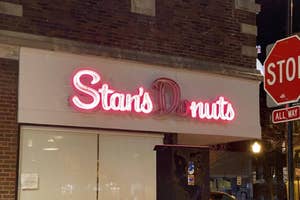 Neon sign for Stan's Donuts but the D and O are burnt out so it spells "stan's nuts" instead