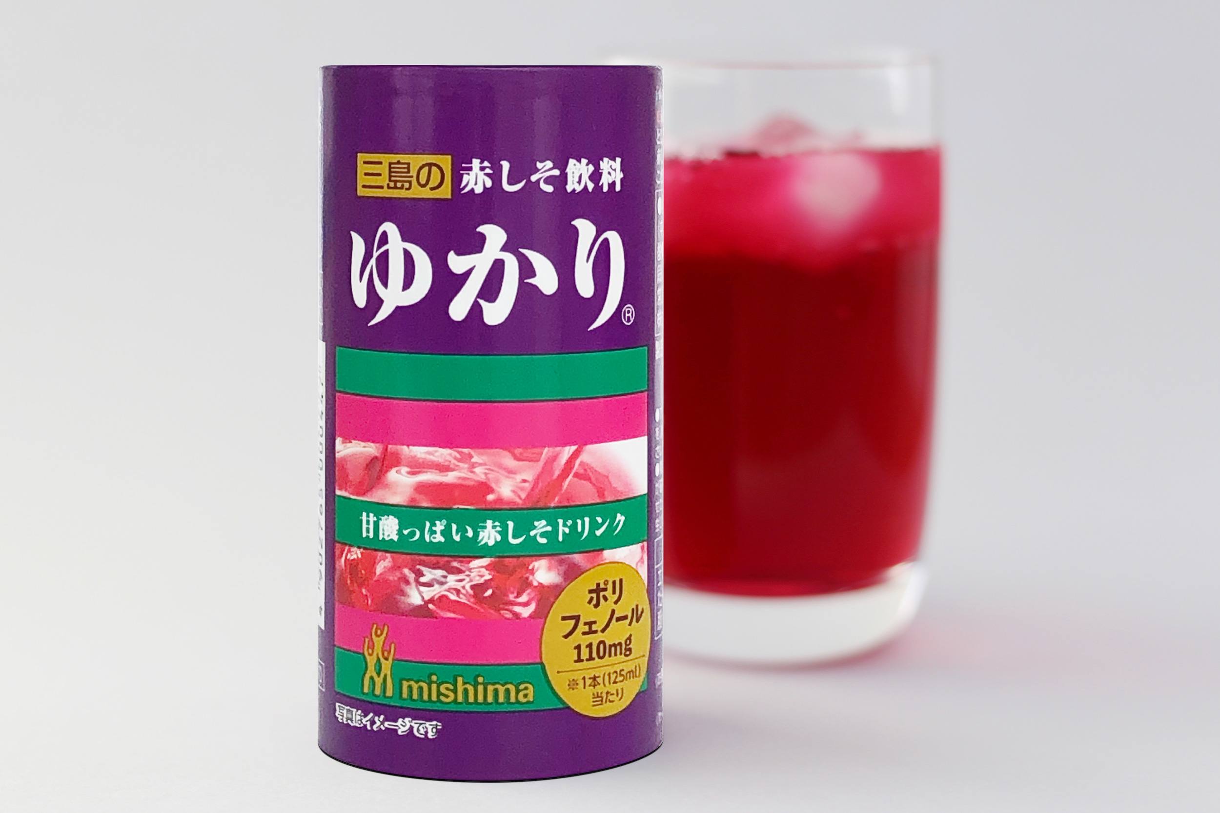 缶とグラスに入った飲み物の写真です。テキストを要約します:「mishima ゆかり 減塩」。