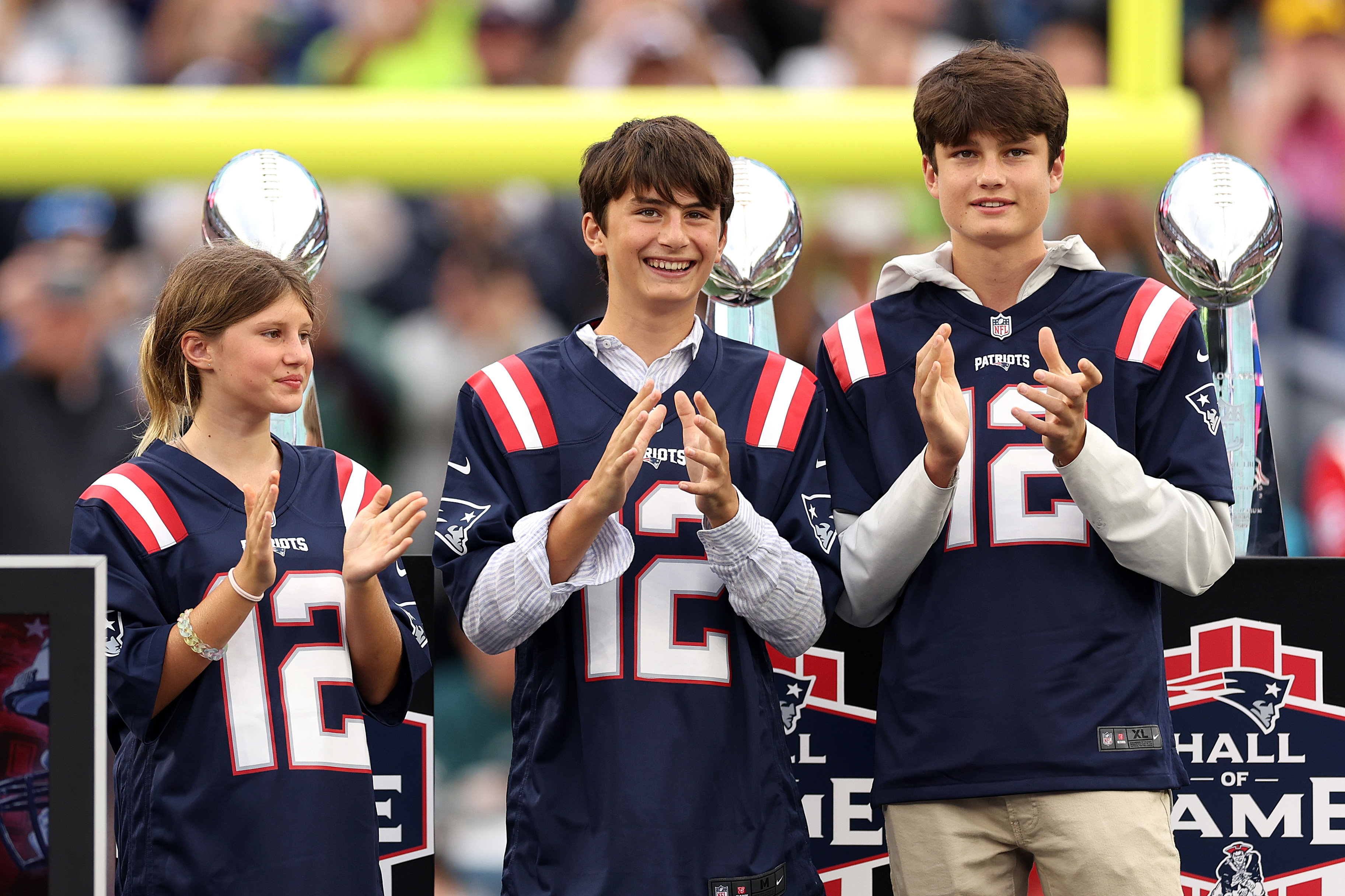 Tom Brady&#x27;s children at an NFL ceremony wearing his Patriots jersey