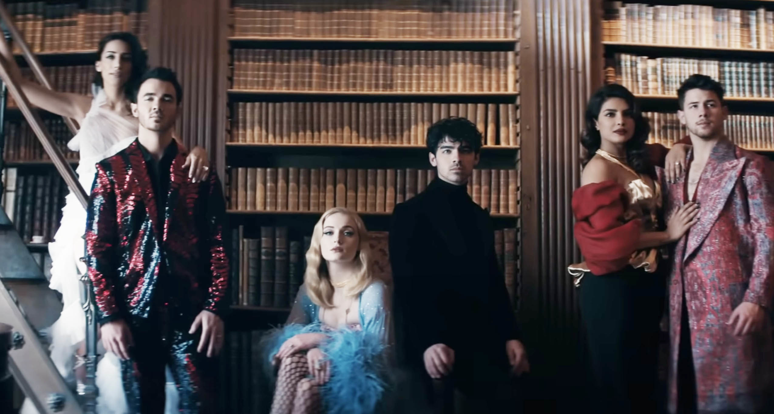 Kevin Jonas, Danielle Jonas, Sophie Turner, Joe Jonas, Nick Jonas, and Priyanka Chopra Jonas in the music video for &quot;Sucker&quot;