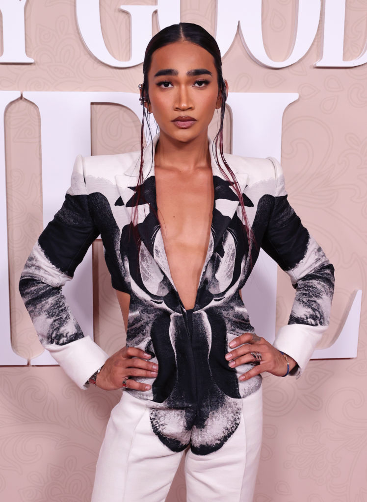 Bretman in chic suit with abstract print posing on red carpet