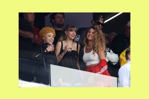 Taylor Swift, Ice Spice, and Blake Lively laughing in a box at a football game