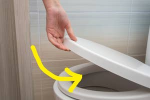 arrow pointing to the inside of a toilet