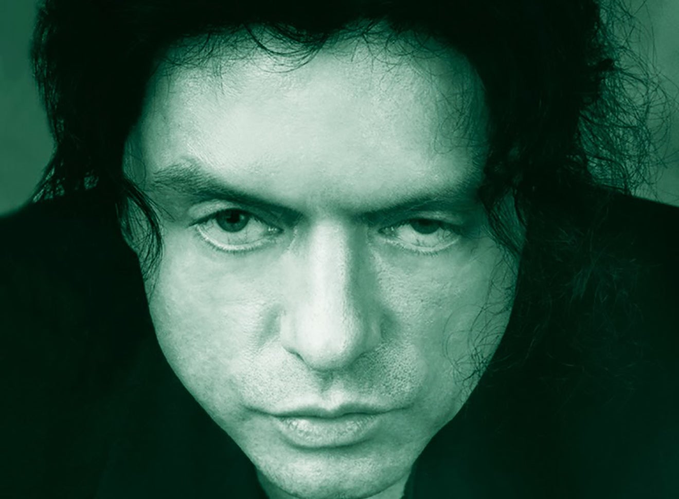 Movie poster of &quot;The Room&quot; featuring Tommy Wiseau with intense expression. Text includes cast and release info