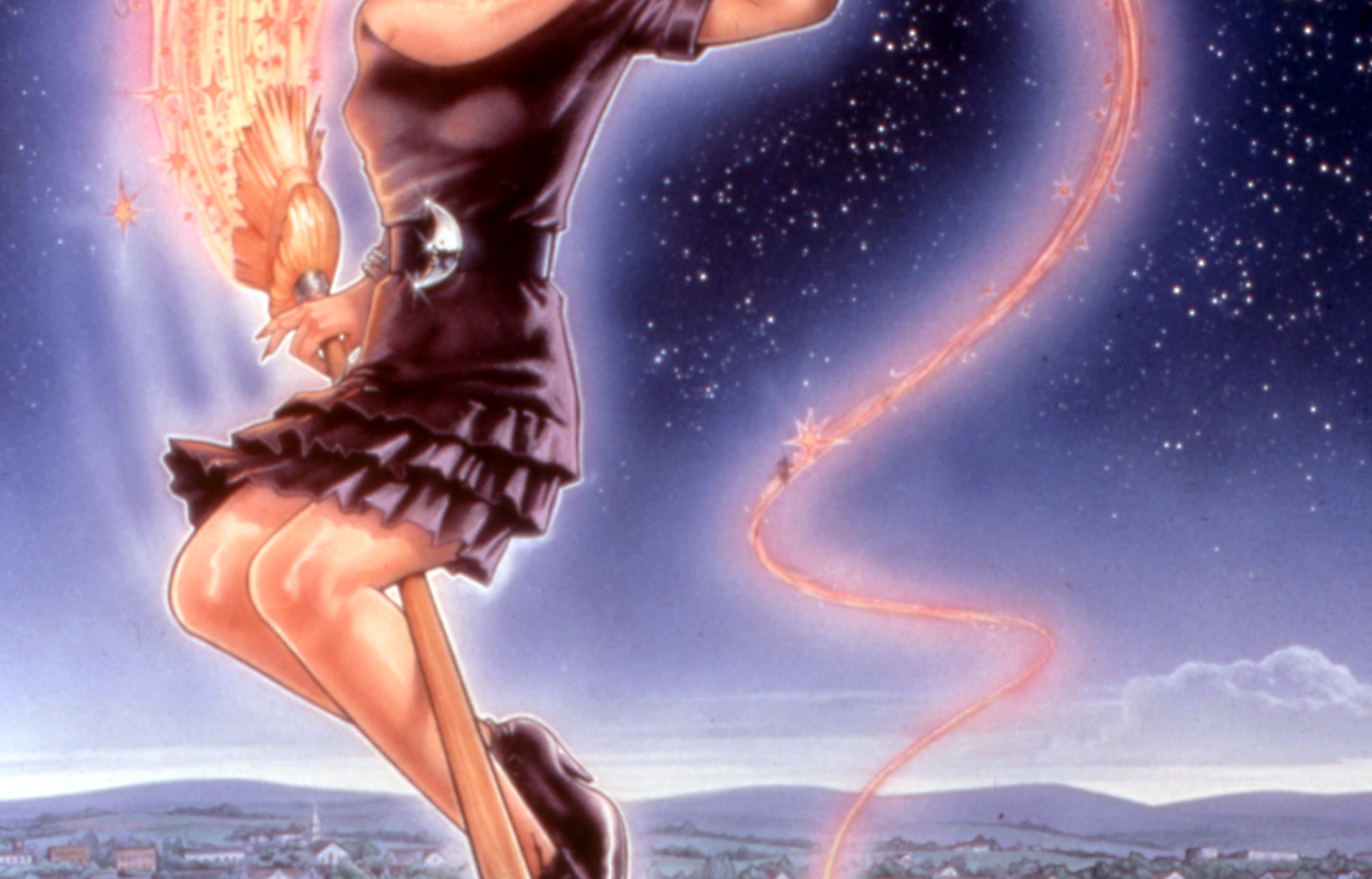 Animated character Sabrina the Teenage Witch flying on a broomstick over a town with a starry sky backdrop