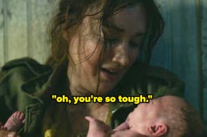 Anna holding baby Ellie in The Last of Us