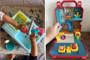 Child playing with a toy kitchen set
