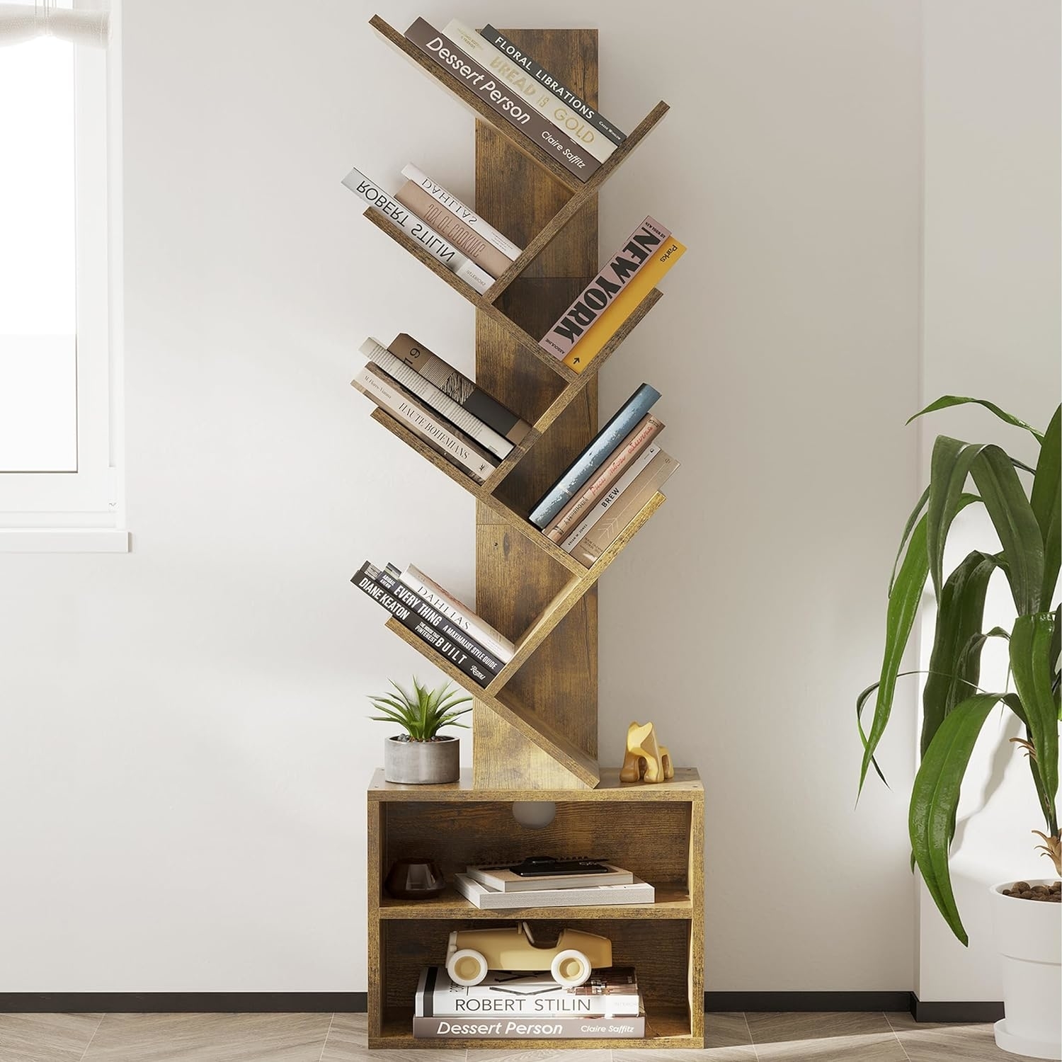 A modern bookshelf with an asymmetric design, filled with books and a few decorative items