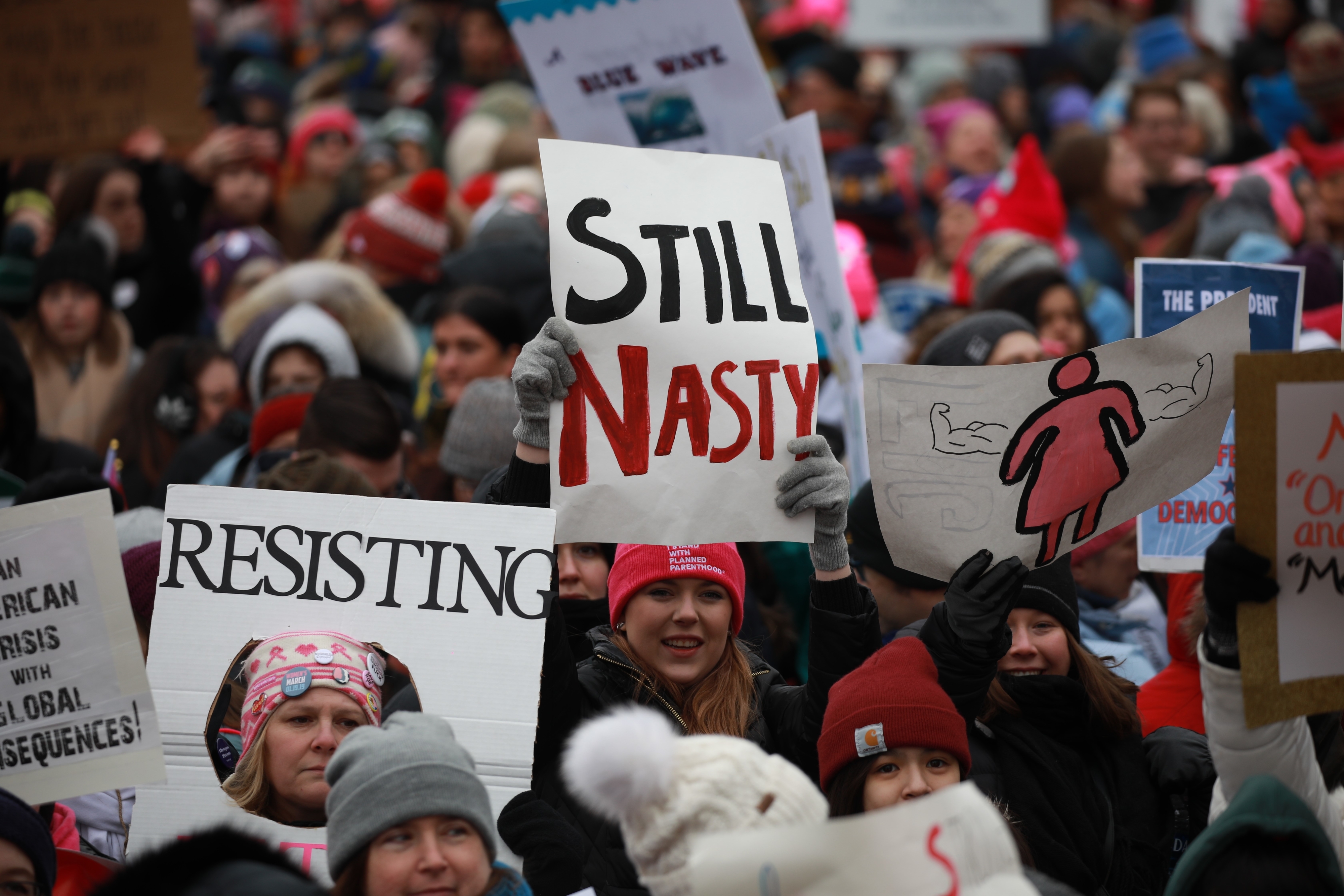 Women at the 2020 womens march with a sign that says Still Nasty