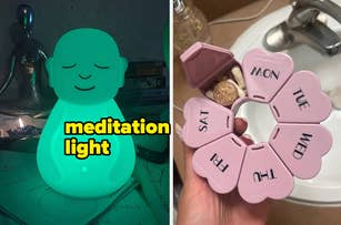 A meditation light figurine and a weekly pill organizer in hand