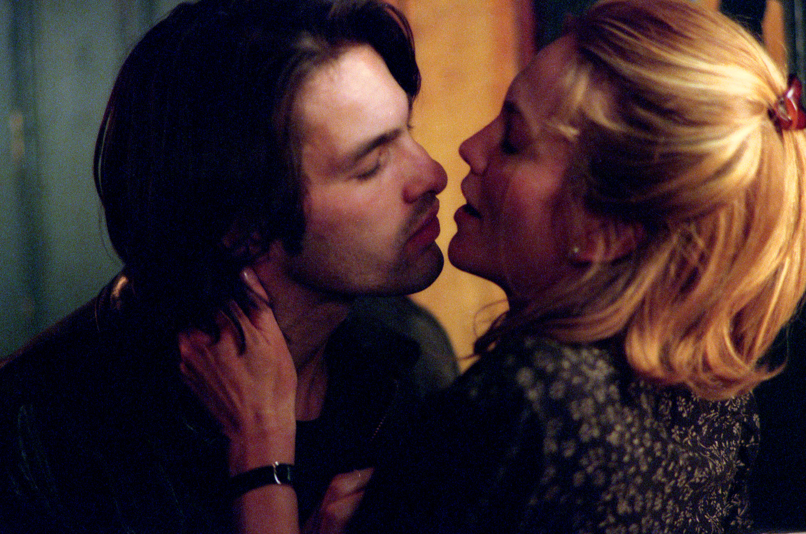 Olivier Martinez and Diane Lane in a close-up, portraying a romantic scene with a man gently holding the woman&#x27;s neck