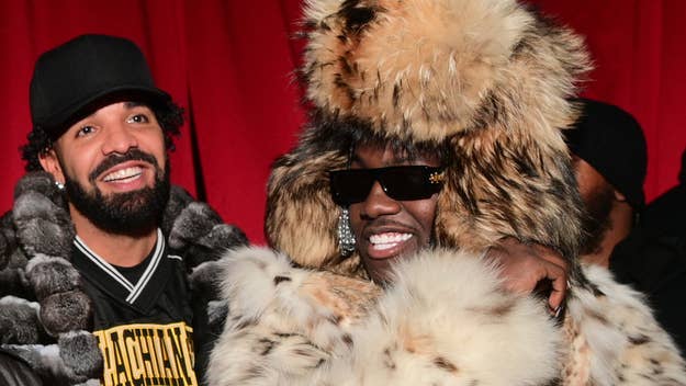 Drake and Lil Yachty smiling together; Drake is wearing a black cap and fur coat, while Lil Yachty is in an extravagant fur outfit and sunglasses