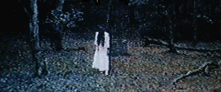 A character from the movie "Ringu" walks toward you