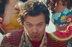 Hatty Styles eating a slice of watermelon in the Watermelon Sugar music video