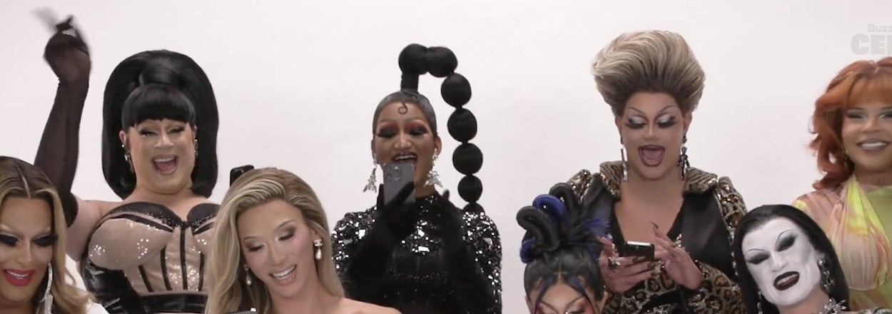 RuPaul wearing a green dress and flexing muscles on the left, with Trixie Mattel, Eureka O'Hara, Gottmik, and Gigi Gorgeous smiling and posing on the right