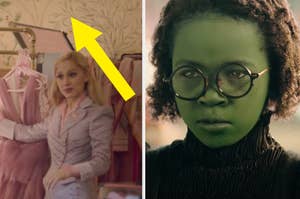 Barbie, dressed in a striped blazer, looks puzzled while holding a pink dress. Elphaba from Wicked has green skin and wears round glasses and a black outfit