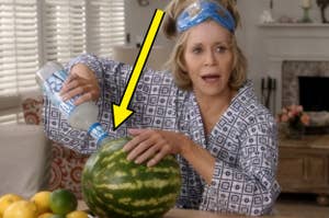 Woman in pajamas pouring water on a watermelon, surprised expression, eye mask on head