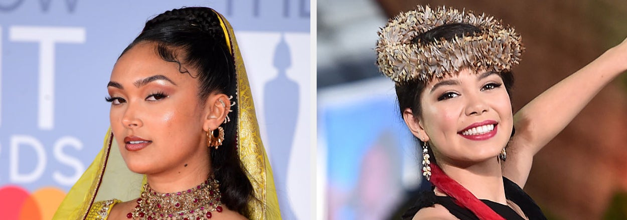 Two women in traditional attire, one in a bejeweled top and headpiece, the other with an ornate headdress