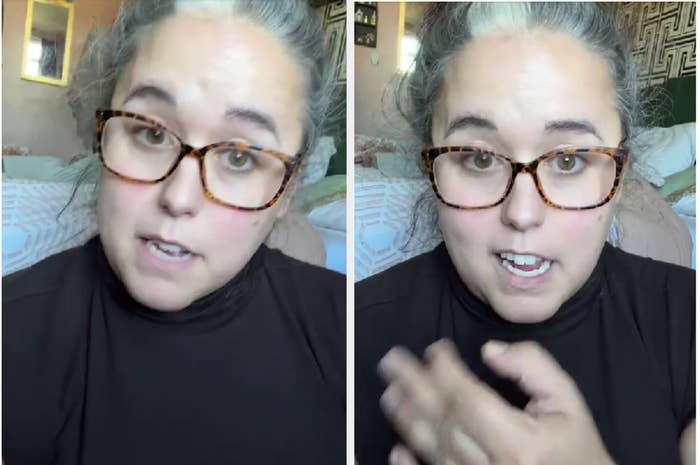 Woman in glasses speaking and gesturing with her hands