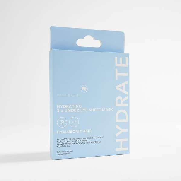 Blue box of Australian Tann Hydrating Under Eye Sheet Mask with hyaluronic acid, fragrance-free, vegan-friendly. Text highlights skin benefits and instant cooling effect