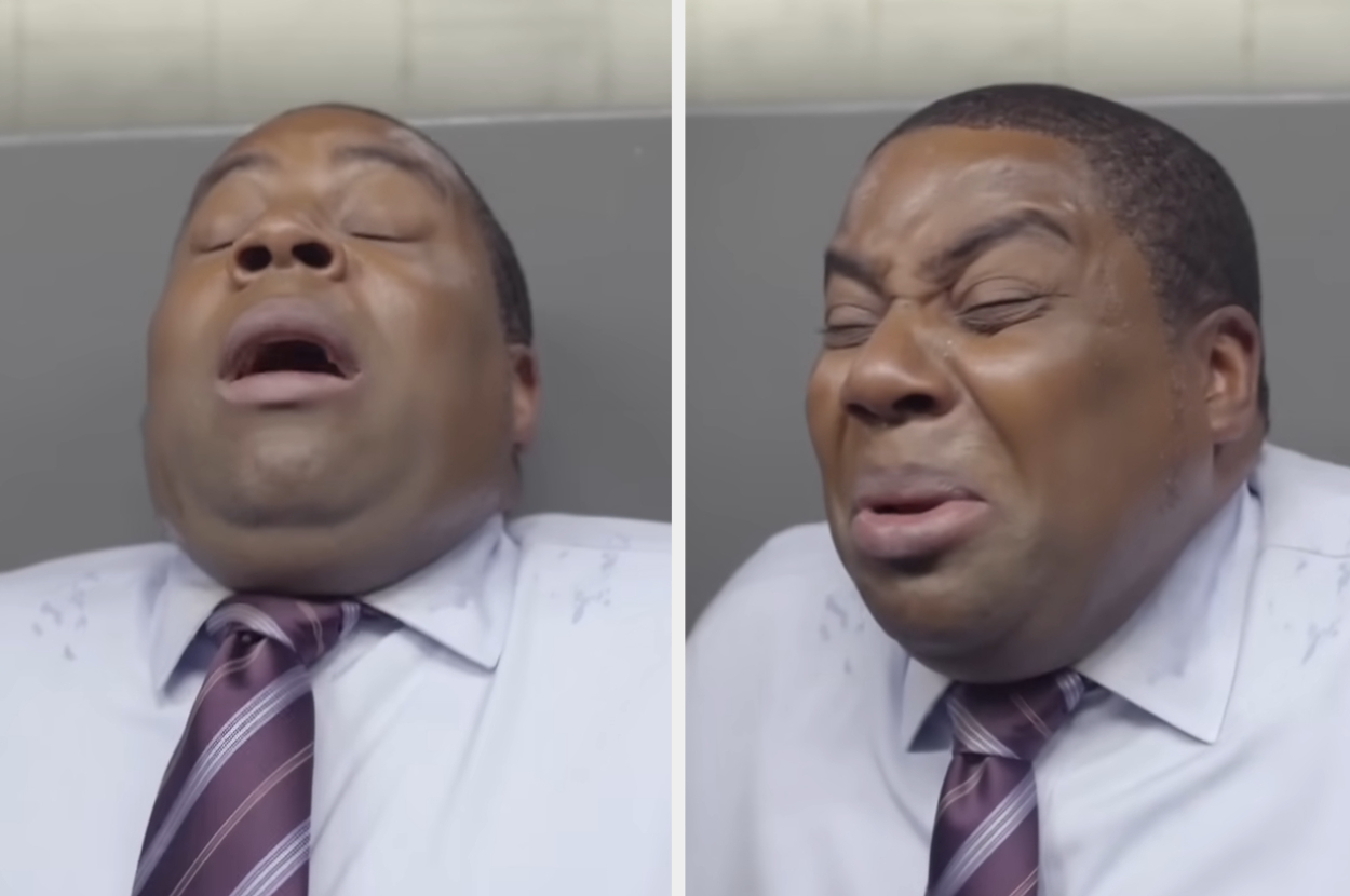 man grimacing at the smell of something