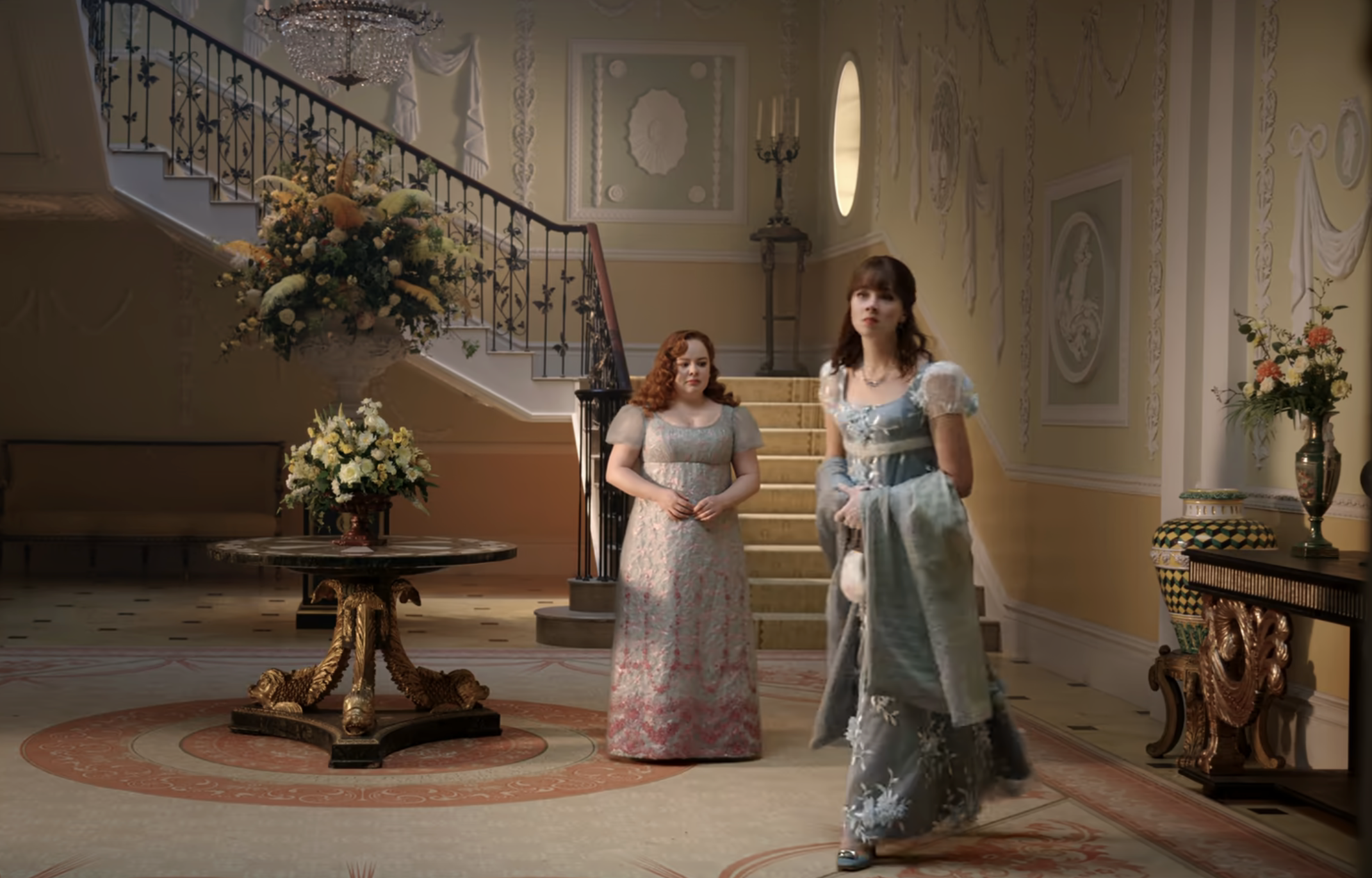 Eloise walking away from Penelope in Bridgerton