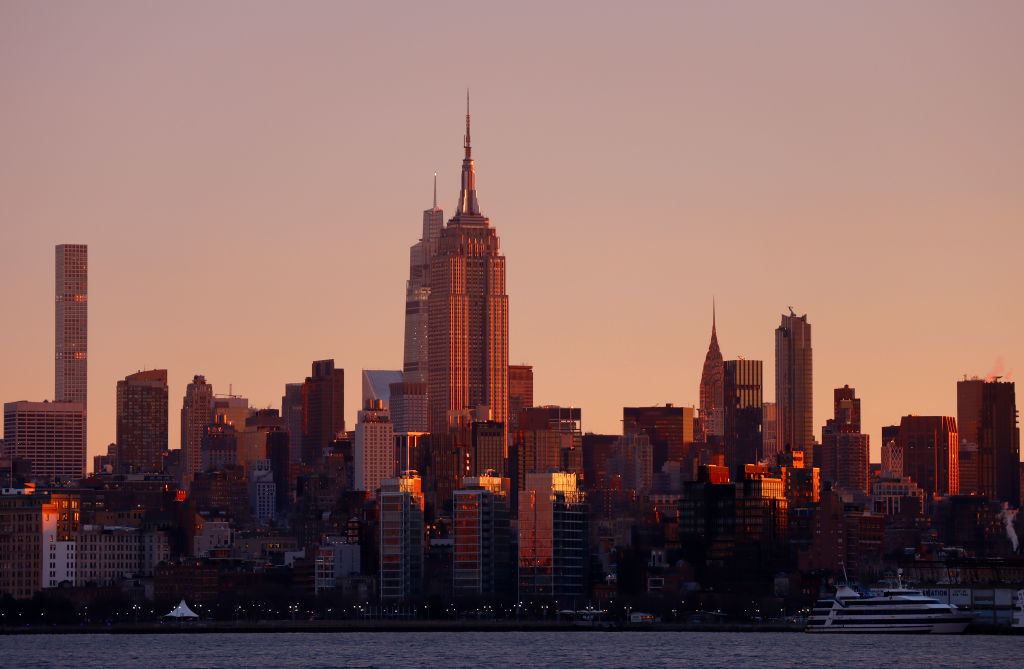 New York City skyline with prominent Empire State Building during sunset