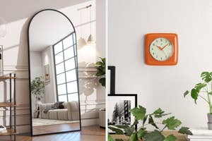 A modern living room with an arch-shaped mirror, wall clock, and framed photo. Decor items for home styling