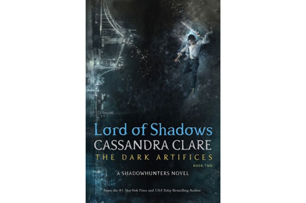 Book cover of &quot;Lord of Shadows&quot; by Cassandra Clare, featuring a figure falling beside a large, lit structure
