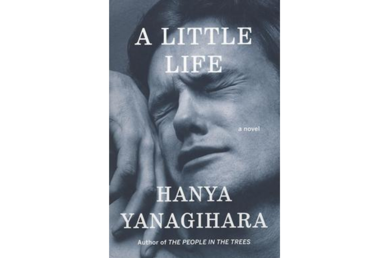 Book cover of &quot;A Little Life&quot; by Hanya Yanagihara, featuring a close-up of a man&#x27;s distressed face cradled by hands