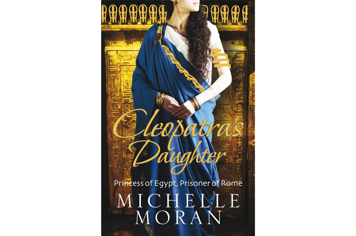 Cover of &quot;Cleopatra&#x27;s Daughter&quot; by Michelle Moran, featuring title and author&#x27;s name with an illustration of a woman in historical dress