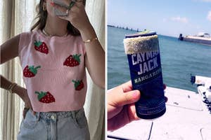 Person in strawberry patterned top and jeans, and a hand holding a canned cocktail by the sea