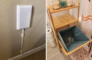 Wall-mounted device possibly for smart home control next to a stylish storage cart with a fabric bin and decorative items