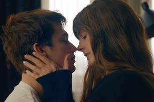 Nicholas Galitzine and Anne Hathaway about to kiss as Hayes and Solene in The Idea of You