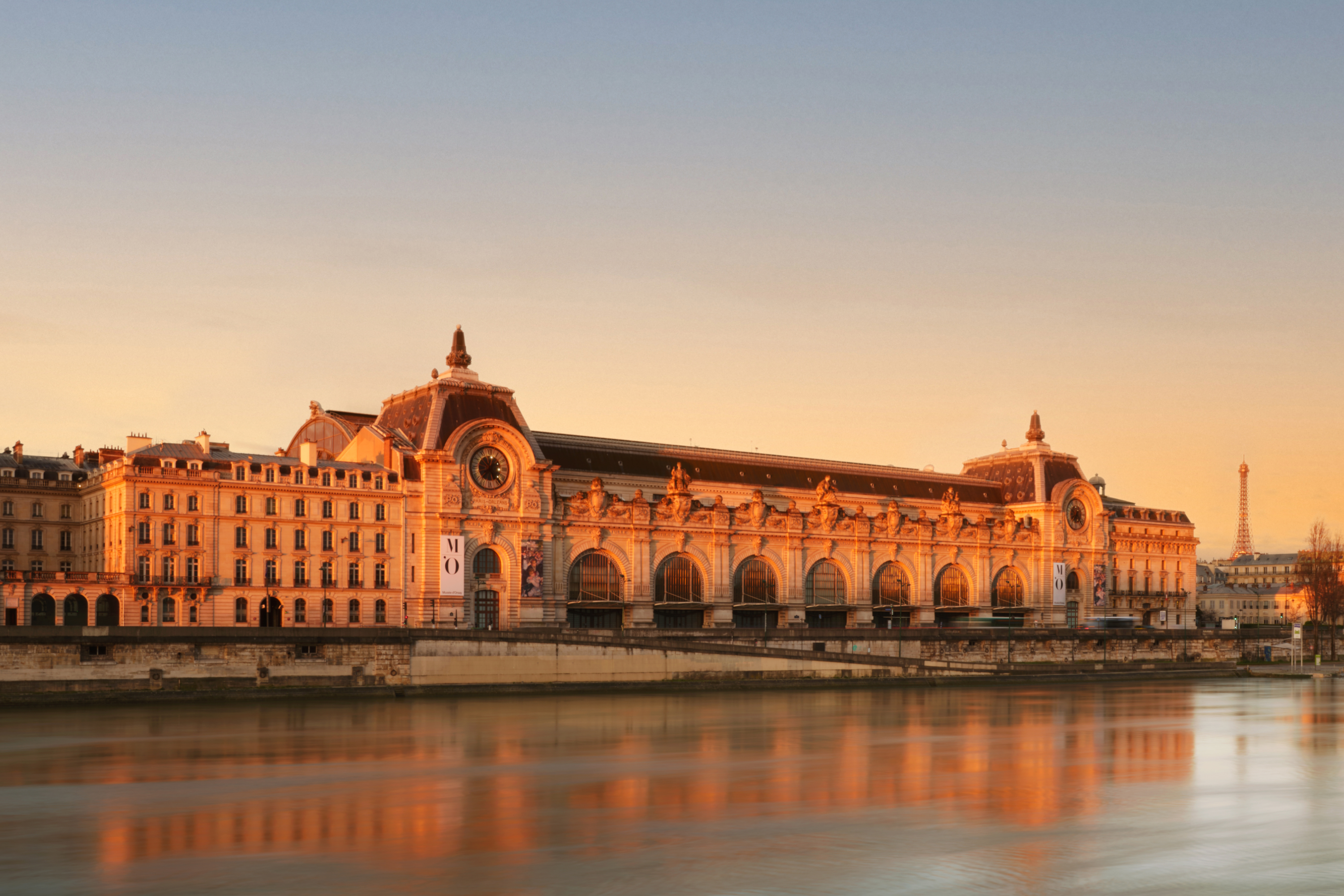 Orsay Museum on the Seine riverbank at sunset