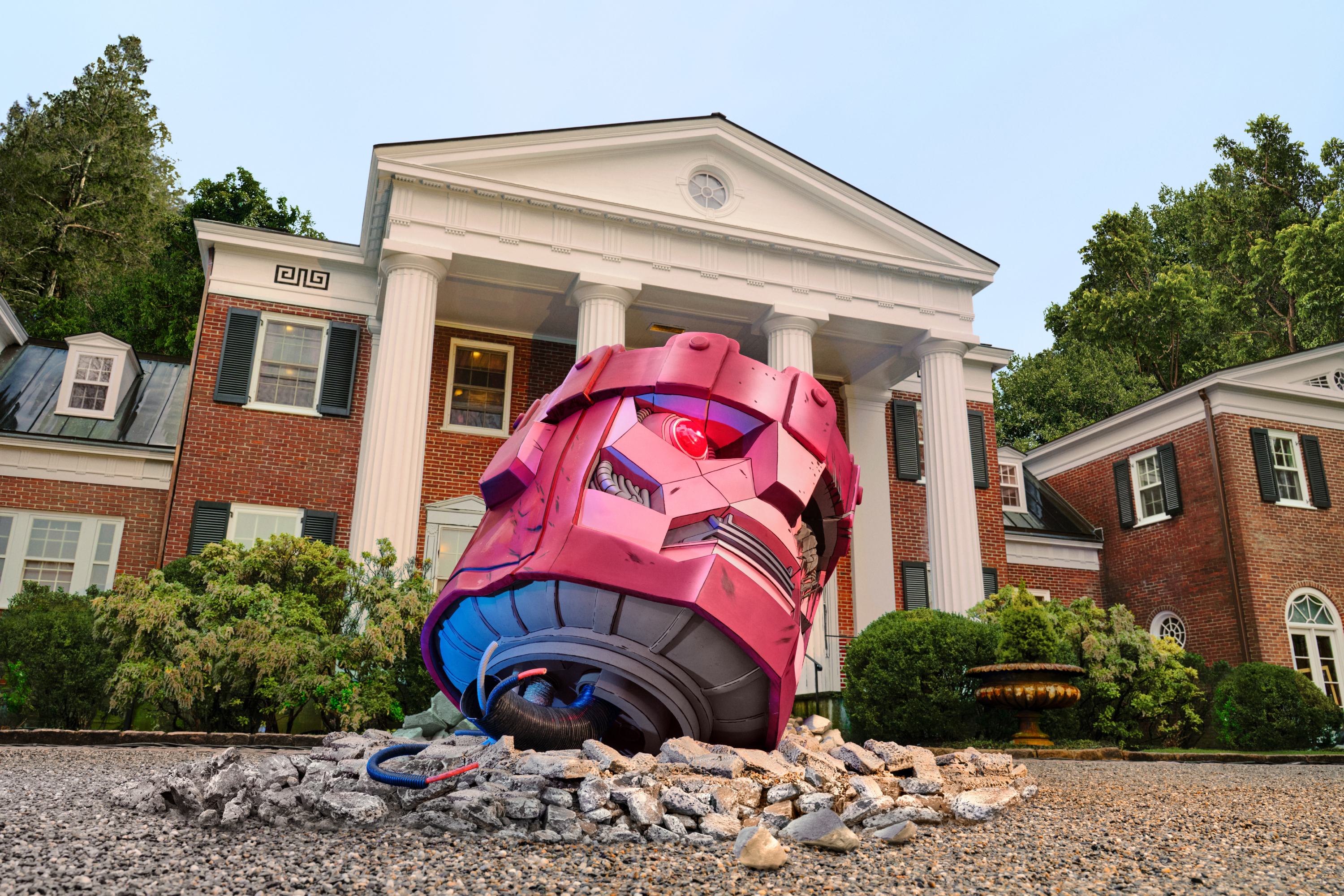 Photo of a large pink robotic suit, resembling Iron Man&#x27;s, crashed in front of a classic-style house