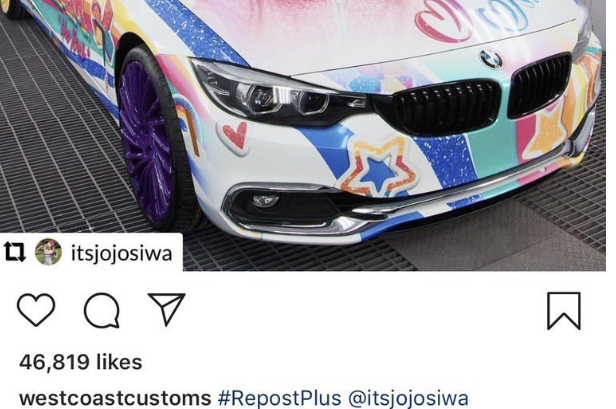 JoJo Siwa stands by her custom-wrapped BMW convertible with her own branding and designs