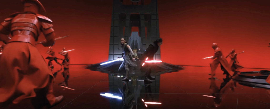 Kylo Ren and Rey engaged in a lightsaber battle with Praetorian Guards in a scene from Star Wars