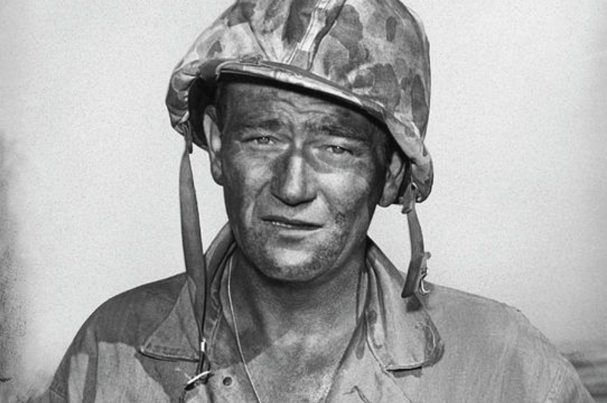 Person in military helmet and fatigues.
