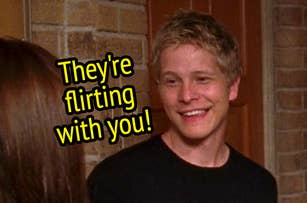 Logan Huntzberger from "Gilmore Girls" with the text "They're flirting with you" overlaid.