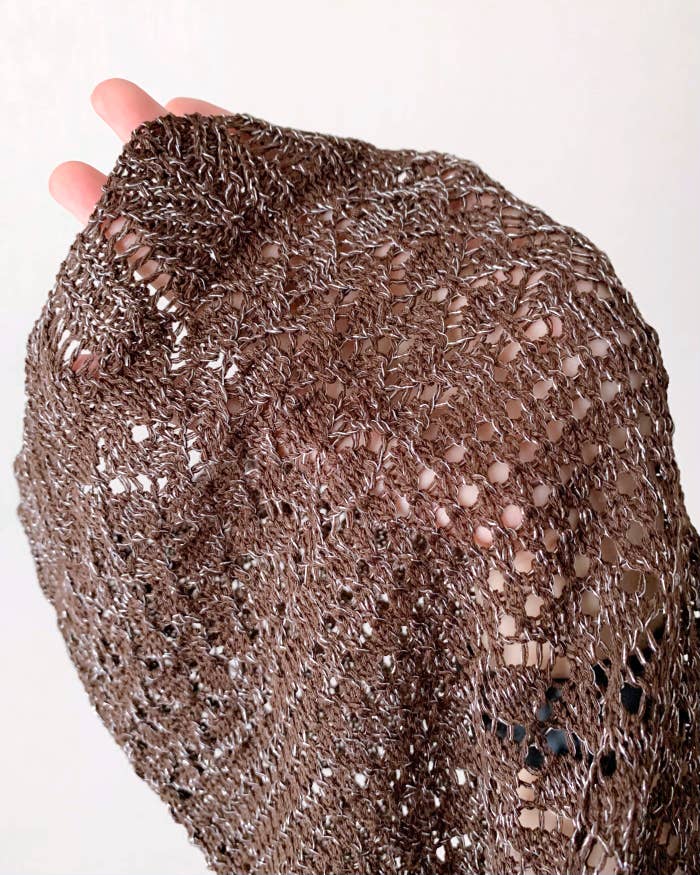 しまむらのおすすめファッションアイテム「透かしラメリボンカーディガン」