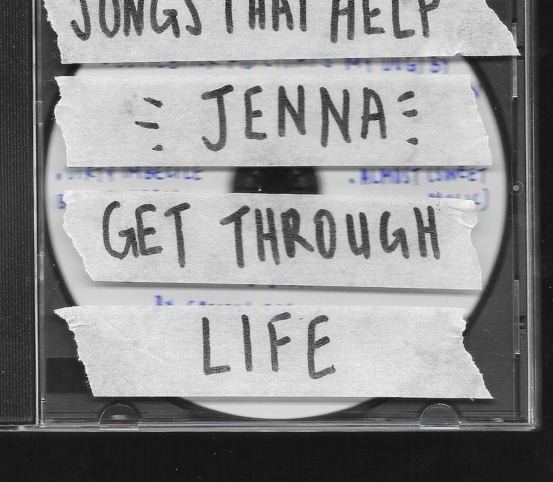 CD case with handwritten text on tape: &quot;Songs That Help Jenna Get Through Life.&quot;