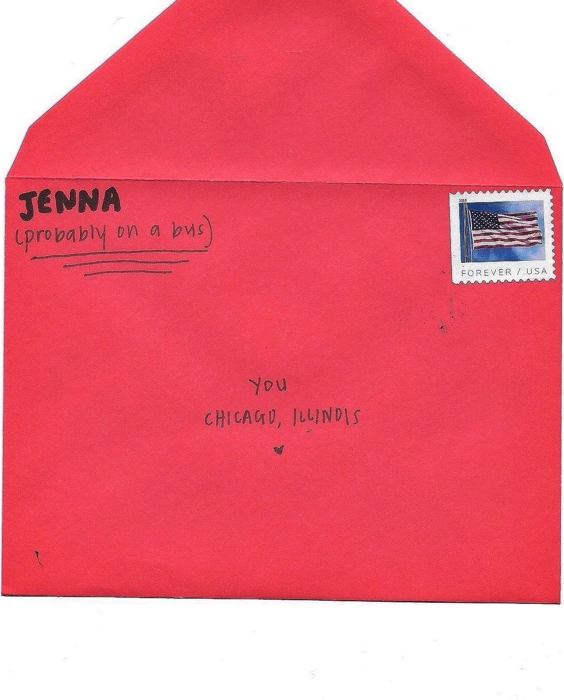 A red envelope addressed to &quot;You, Chicago, Illinois&quot; and from &quot;Jenna (probably on a bus),&quot; with a U.S. postage stamp