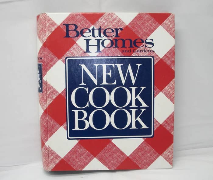 Cover of "Better Homes and Gardens New Cook Book" with a red checkered pattern background