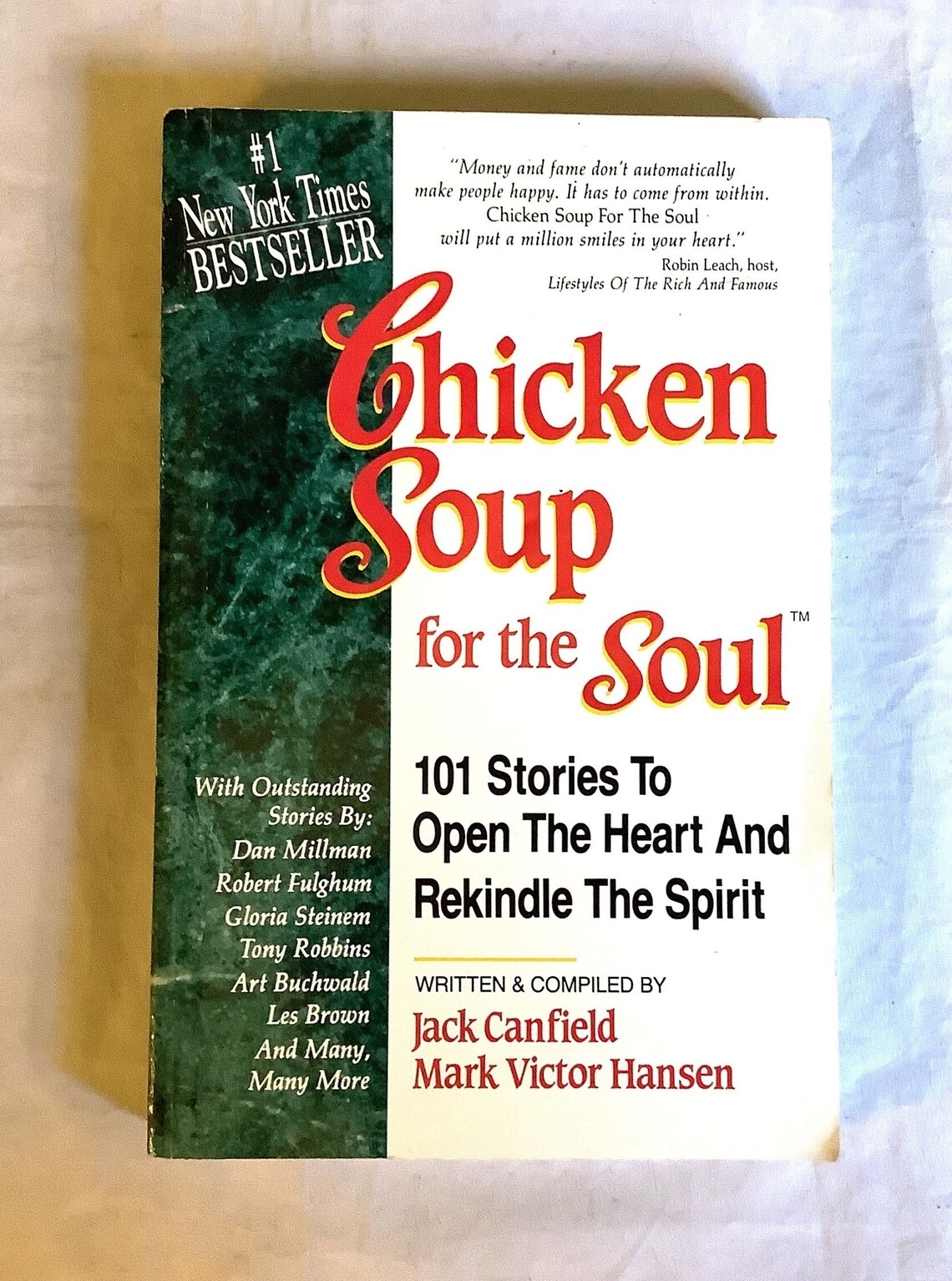 Book cover for "Chicken Soup for the Soul: 101 Stories to Open the Heart and Rekindle the Spirit" by Jack Canfield and Mark Victor Hansen, a #1 New York Times Bestseller