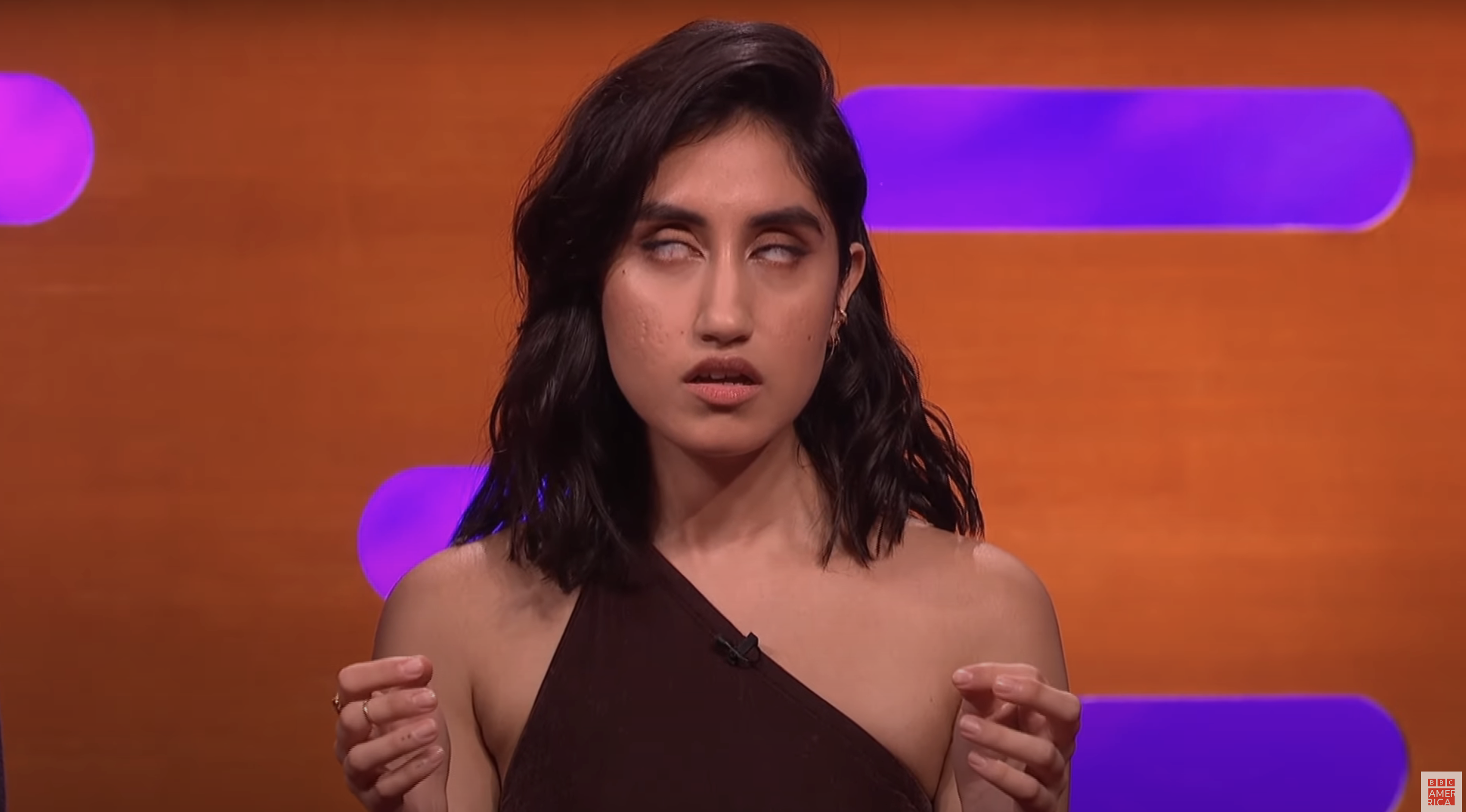 Ambika demonstrates how she sleeps by rolling her eyes back into her head