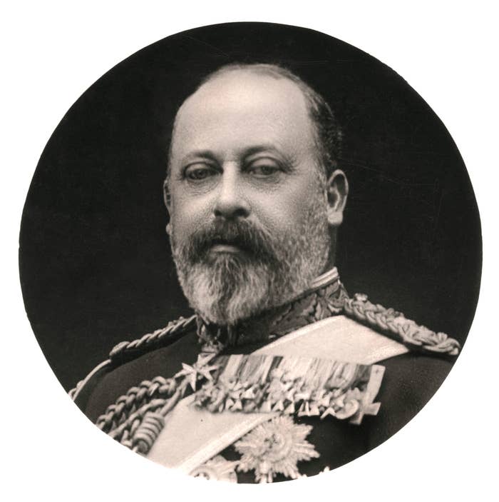 A historical portrait of King Edward VII, wearing a military uniform adorned with medals and elaborate decorations