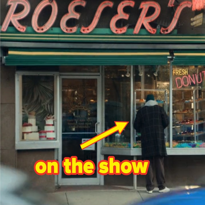 A person in a coat stands in front of Roeser's Bakery, which has a neon sign reading "Fresh Donuts" and "Home Made Ice Cream." A blue car passes in the foreground