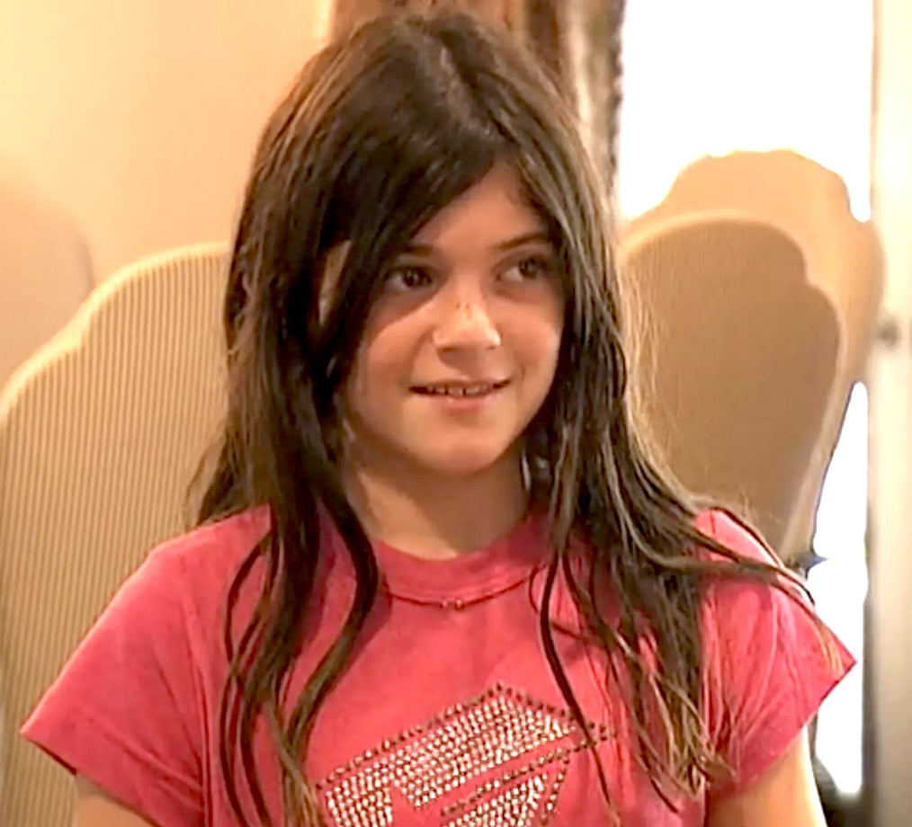 Young Kylie Jenner looking to the side
