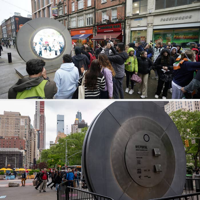 A crowd gathers around a portal-like installation on a busy street, showing a live video feed on its circular screen in an urban setting